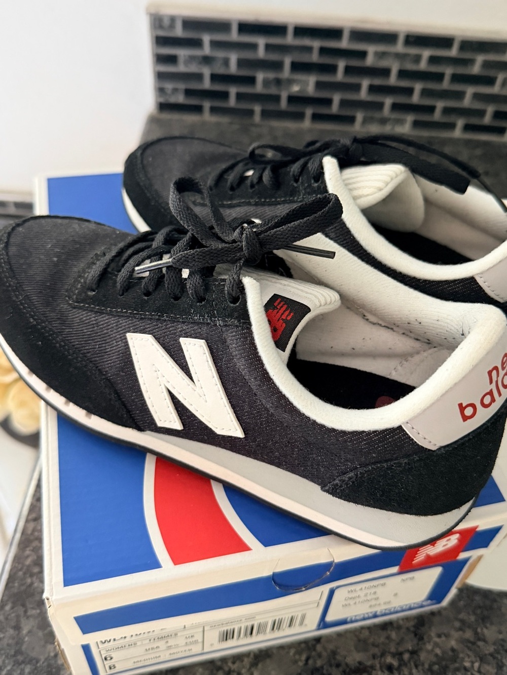 New Balance Black & White Classic Low-Top Sneakers with Red Heel Branding size 6